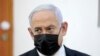 PM Israel Benjamin Netanyahu menghadiri persidangan di mana dia dituduh melakukan korupsi, di pengadilan distrik Yerusalem, di Salah El-Din, Yerusalem Timur, Senin, 5 April 2021. (Abir Sultan / Pool image via AP)