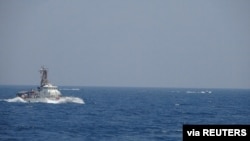 FILE - An Islamic Revolutionary Guard Corps vessel in the Strait of Hormuz, May 10, 2021. The U.S. military said Tuesday that an IRG Corps Navy boat came within 150 yards of American warships in the Strait of Hormuz on Dec. 5, 2022. (U.S. Navy photo)