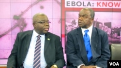 H.E. Bockari Stevens, Sierra Leone's ambassador to the United States, chats with Malonga Miatudila, a physician and Ebola expert, at VOA in Washington, Nov. 19, 2014.