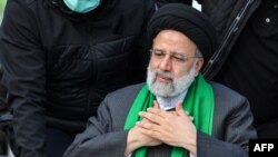 This handout picture provided by the Iranian presidency shows President Ebrahim Raisi speaking at a rally in Iran's central city of Yazd, Jan. 12, 2023. Raisi has vowed that WhatsApp and Instagram will remain blocked in the country.