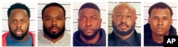 This combo of booking images provided by the Shelby County Sheriff's Office shows, from left, Tadarrius Bean, Demetrius Haley, Emmitt Martin III, Desmond Mills, Jr. and Justin Smith.