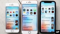 FILE - From left the iPhone 8, iPhone 8 Plus, and the iPhone XR are seen in New York, Oct. 22, 2018. 