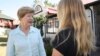 Trish Heslop, left, director of Guild Cottage, talks with one of its residents, Jessica, a teen who suffered sexual abuse when she was younger. Jessica is now undergoing therapy and is a top academic achiever. (D. Taylor/VOA)
