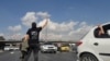 Iranian Protesters Clash With Police Near Tehran 