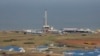 Uganda Hails Oil Production, Critics Fear Environmental Costs 