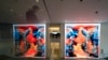 Visitors view artist Refik Anadol's "Unsupervised" exhibit at the Museum of Modern Art, Jan. 11, 2023, in New York. 