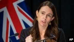 FILE - New Zealand Prime Minister Jacinda Ardern gestures during the post-Cabinet press conference in Wellington, New Zealand, Monday, March 7, 2022.