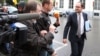FILE - Belgium Justice Minister Vincent Van Quickenborne, right, at the Prime Minister's Residence in Brussels, July 16, 2012. He said aid worker Olivier Vandecasteele was "innocently arrested in February and has been held under inhumane conditions since."