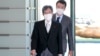 FILE - Minister of Internal Affairs Minoru Terada arrives at the prime minister's office in Tokyo, Japan, Aug. 10, 2022. 