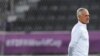 France's head coach Didier Deschamps walks on the pitch during training in Doha, Qatar, Dec. 16, 2022. "I have no worries or stress," he said about France's World Cup Final match against Argentina. "The important thing in preparing for a match like this is to remain calm." 