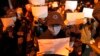 China Blames Foreigners for Inciting Protests