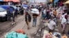 A laborer pushes a handcart at the Mercato open-air marketplace in the district of Addis Ababa, July 21, 2022. (Tiksa Negeri/Reuters)