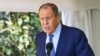 In this handout photo released by the Russian Foreign Ministry Press Service, Russian Foreign Minister Sergey Lavrov speaks during a news conference with Ugandan President Yowerei Museveni (not pictured) in Entebbe, Uganda, July 26, 2022. From Uganda, Lavrov heads to Ethiopia.
