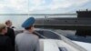Фото: президент Росії Путін під час дня ВМС в Сєвєроморську в 2014 - місця базування підводного апарату, де трапилась пожежа