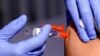 FILE - A patient is given a flu vaccine at a community clinic in Lynwood, Calif., Oct. 28, 2022. The Centers for Disease Control and Prevention estimates that in the week set to end Dec. 24, 2022, the omicron subvariant XBB will account for 18.3% of U.S. COVID-19 cases.