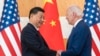 FILE - U.S. President Joe Biden, right, and Chinese President Xi Jinping shake hands before a meeting on the sidelines of the G-20 summit meeting on Nov. 14, 2022, in Bali, Indonesia. 