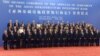 Chinese President Xi Jinping, ninth from right, poses for a group photo with Swiss Economy Minister Johann Schneider-Ammann, ninth from left, and delegates attending the signing ceremony for the Articles of Agreement of the Asian Infrastructure Investment