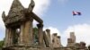 A Cambodian flag flutters near an entrance gate to Cambodia's Preah Vihear temple on the Cambodian-Thai- border in Preah Vihear province.