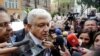 FILE - While still Mexico's president-elect, Andres Manuel Lopez Obrador talks to journalists in Mexico City, Mexico, July 7, 2018. A group of Mexican journalists, columnists and commentators have since demanded that Lopez Obrador, now president, stop harassing critical media.