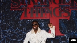 L'acteur américain Caleb McLaughlin assiste à la première de la saison 4 de "Stranger Things" de Netflix à Brooklyn, New York le 14 mai 2022.