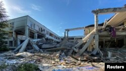 A view shows a destroyed school in a military strike on the previous night, amid Russia's invasion of Ukraine, in Kharkiv, June 2, 2022.