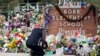 Reggie Daniels pays his respects a memorial at Robb Elementary School, June 9, 2022, in Uvalde, Texas, created to honor the victims killed in the recent school shooting.