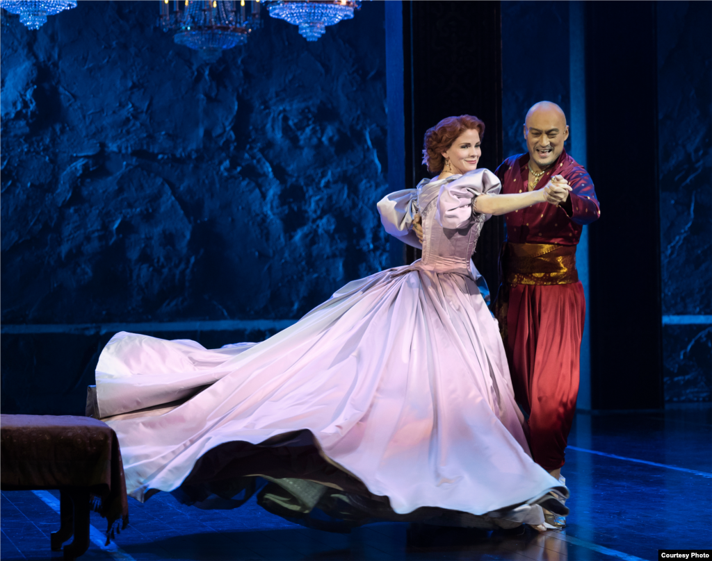 Anna (Kelli O&rsquo;Hara) teaches the King (Ken Watanabe) to dance in the Western style. (Paul Kolnik)