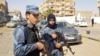 FILE - An image grab taken from a video from AFPTV, on Feb. 6, 2019, shows forces loyal to Libyan strongman Khalifa Haftar patrolling in downtown Sebha, the biggest city in southern Libya. 
