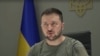 Ukrainian President Volodymyr Zelenskyy is seen addressing African Union representatives via videolink in this screen grab from Reuters video.