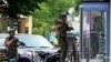6 Dead, 30 Hurt in Shooting in Chicago Suburb; Person of Interest in Custody