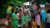 Muslim children gather at a water pump outside the mosque at PK12 in Bangui, Central African Republic, Thursday April 10, 2014.