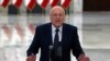 Lebanese Prime Minister-designate Najib Mikati, speaks to journalists after his meeting with Lebanese President Michel Aoun, at the Presidential Palace in Baabda, east of Beirut, Lebanon, July 26, 2021.