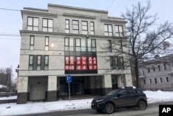 FILE - A view of the four-story building known as the "troll factory" is seen in St. Petersburg, Russia, Feb. 17, 2018.