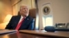 Rais Donald Trump akizungumza na waandishi wa habari ndani ya ndege ya Air Force One, Fberuari 9, 2025. Picha ya AP