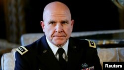 FILE - Newly named National Security Adviser Army Lt. Gen. H.R. McMaster listens as U.S. President Donald Trump makes the announcement at his Mar-a-Lago estate in Palm Beach, Florida, Feb. 20, 2017. 
