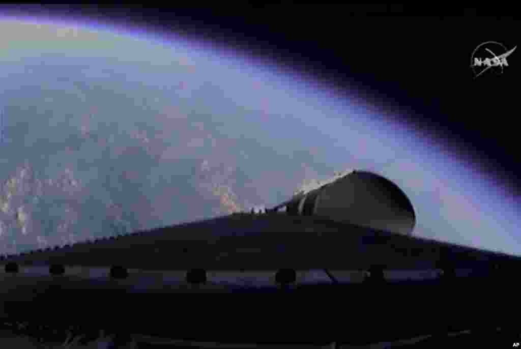 This photo provided by NASA-TV, shows the view from the Orion spacecraft atop a United Launch Alliance Delta 4-Heavy rocket as it climbs to orbit during the first test flight, Friday Dec. 5, 2014.