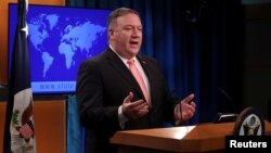 FILE - U.S. Secretary of State Mike Pompeo speaks to reporters during a news briefing at the State Department in Washington, Oct. 23, 2018.