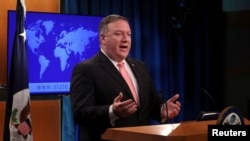 U.S. Secretary of State Mike Pompeo speaks to reporters during a news briefing at the State Department in Washington, Oct. 23, 2018.