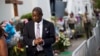 Church member Thomas Rose leaves a wake for Sen. Clementa Pinckney, one of the nine killed in last week's shooting at Emanuel AME Church, June 25, 2015, in Charleston. 
