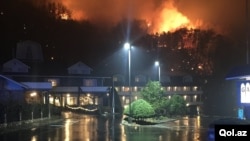 A wildfire burns on a hillside after a mandatory evacuation was ordered in Gatlinburg, Tennessee in a picture released Nov. 30, 2016. 
