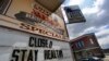 FILE - A sign announces a coronavirus closure at a restaurant in Livermore Falls, Maine, April 16, 2020. 