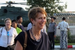 FILE - U.N. Special Envoy for Myanmar Christine Schraner Burgener arrives at Sittwe airport after visiting Maung Daw Township at the Bangladesh-Myanmar border area in Rakhine state, Oct. 15, 2018.