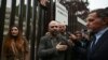 Writer Roberto Saviano (C) leaves the City of Justice in Rome, Nov. 15, 2022,following a hearing in a defamation lawsuit from Italy's current prime minister. 