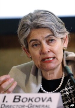 FILE - UNESCO chief Irina Bokova denounces Islamic State militants' attacks on cultural heritage.