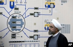 FILE - President Hassan Rouhani visits the Bushehr nuclear power plant just outside the port city of Bushehr, Iran, Jan. 13, 2015, in this photo released by the Iranian Presidency Office.