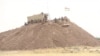 IS Flees Iraqi Villages, Leaving Lethal Roadside Bombs