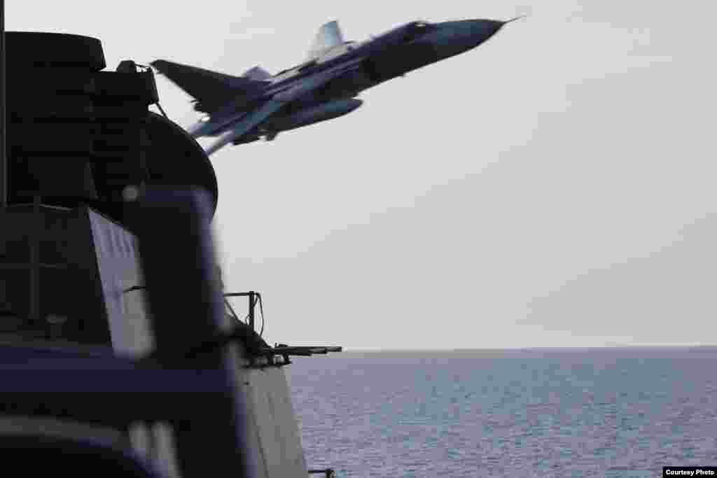 Image of Russian fly-over near guided-missile destroyer USS Donald Cook in Baltic Sea as provided by the U.S. Navy 6th Fleet.