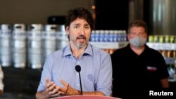 FILE - Canada's Prime Minister Justin Trudeau speaks to the media.
