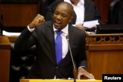FILE - Opposition Democratic Alliance (DA) party leader Mmusi Maimane speaks in parliament in Cape Town, South Africa, Aug. 8, 2017.