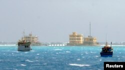 Vietnamese fishing boats last year in the disputed Spratly archipelago area of the South China Sea. (REUTERS/Quang Le)